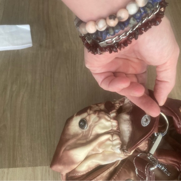 Never used gorgeous leather maroon and white purse. Perfect condition. - Picture 11 of 13